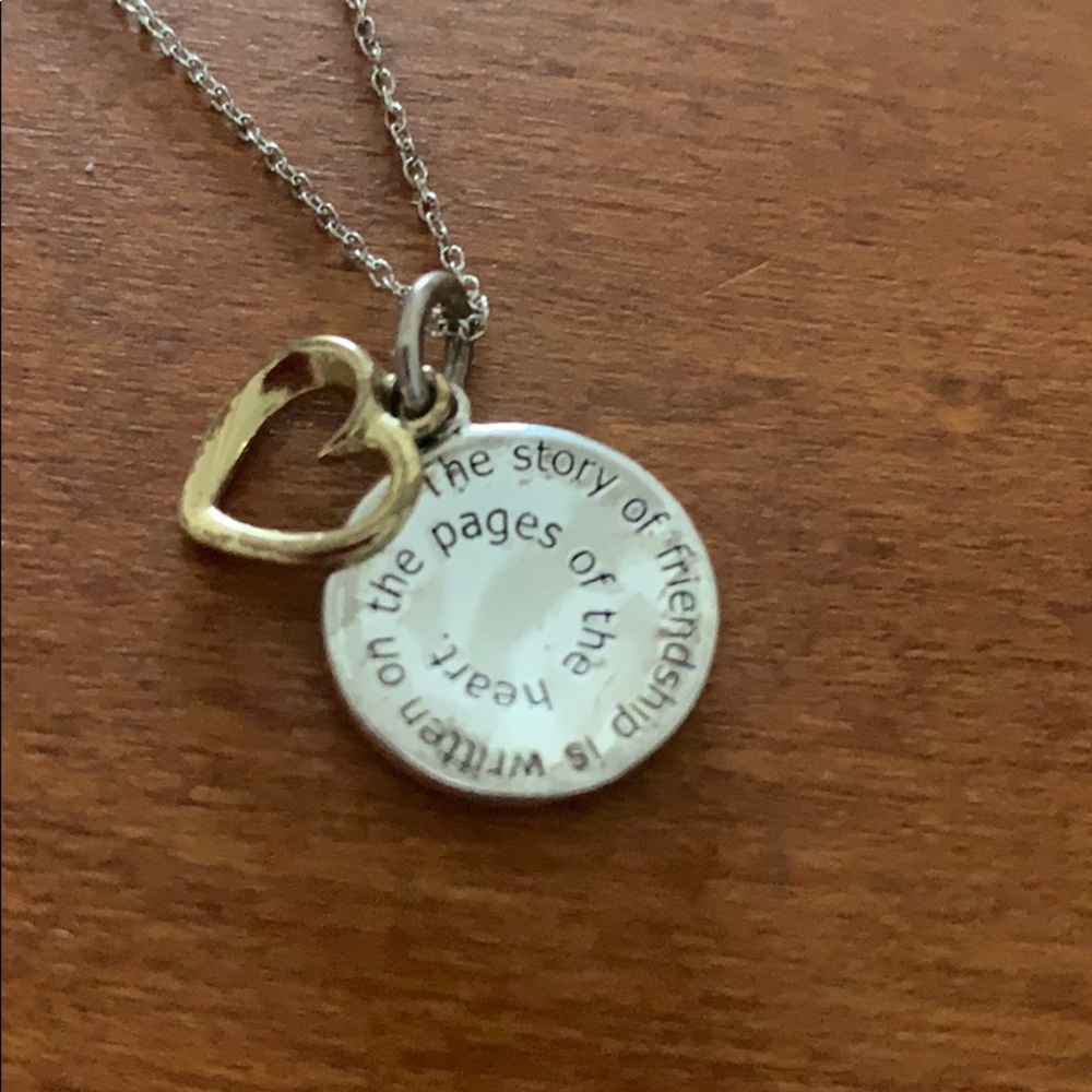 Medallion necklace.